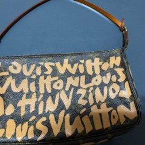 Authentic Louis Vuitton Grafiti Pochette